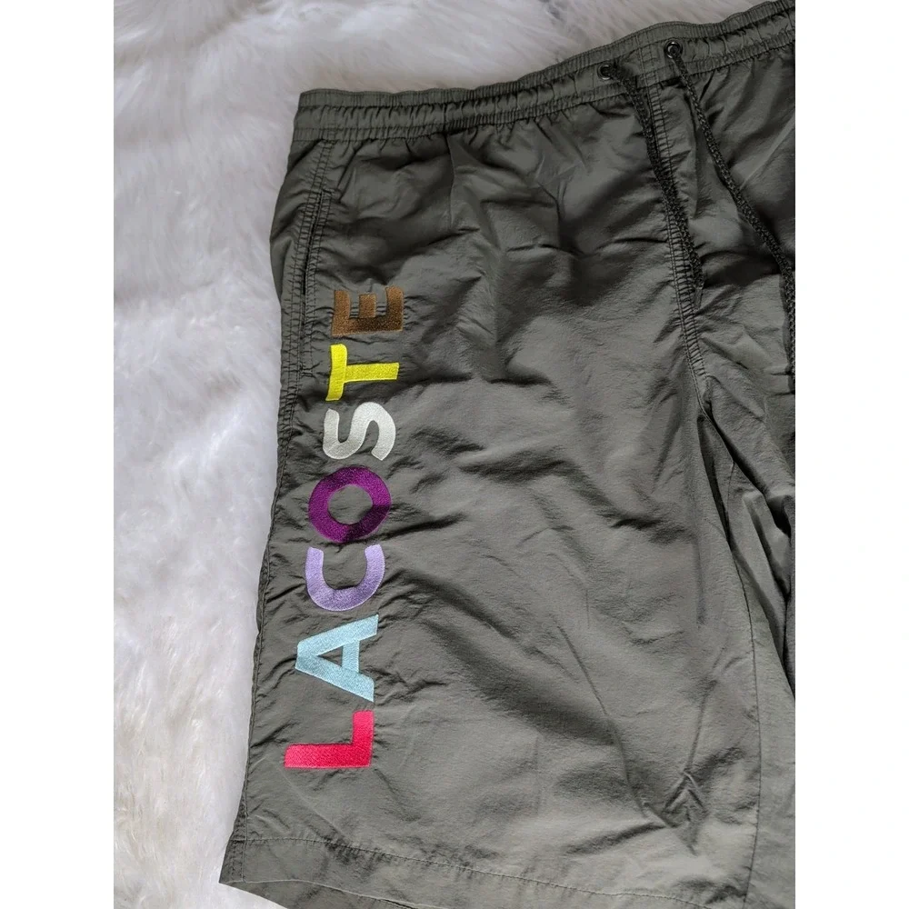 Lacoste Swim Trunks Mens‎ 8 XXXL Olive Green Multi Color Logo Graphic Shorts